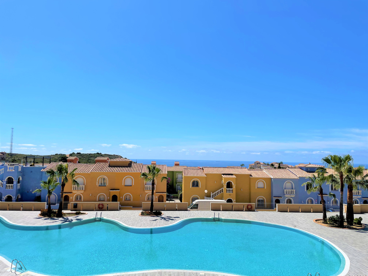A beautiful two bedroom, one bathroom apartment overlooking the pool and with sea views